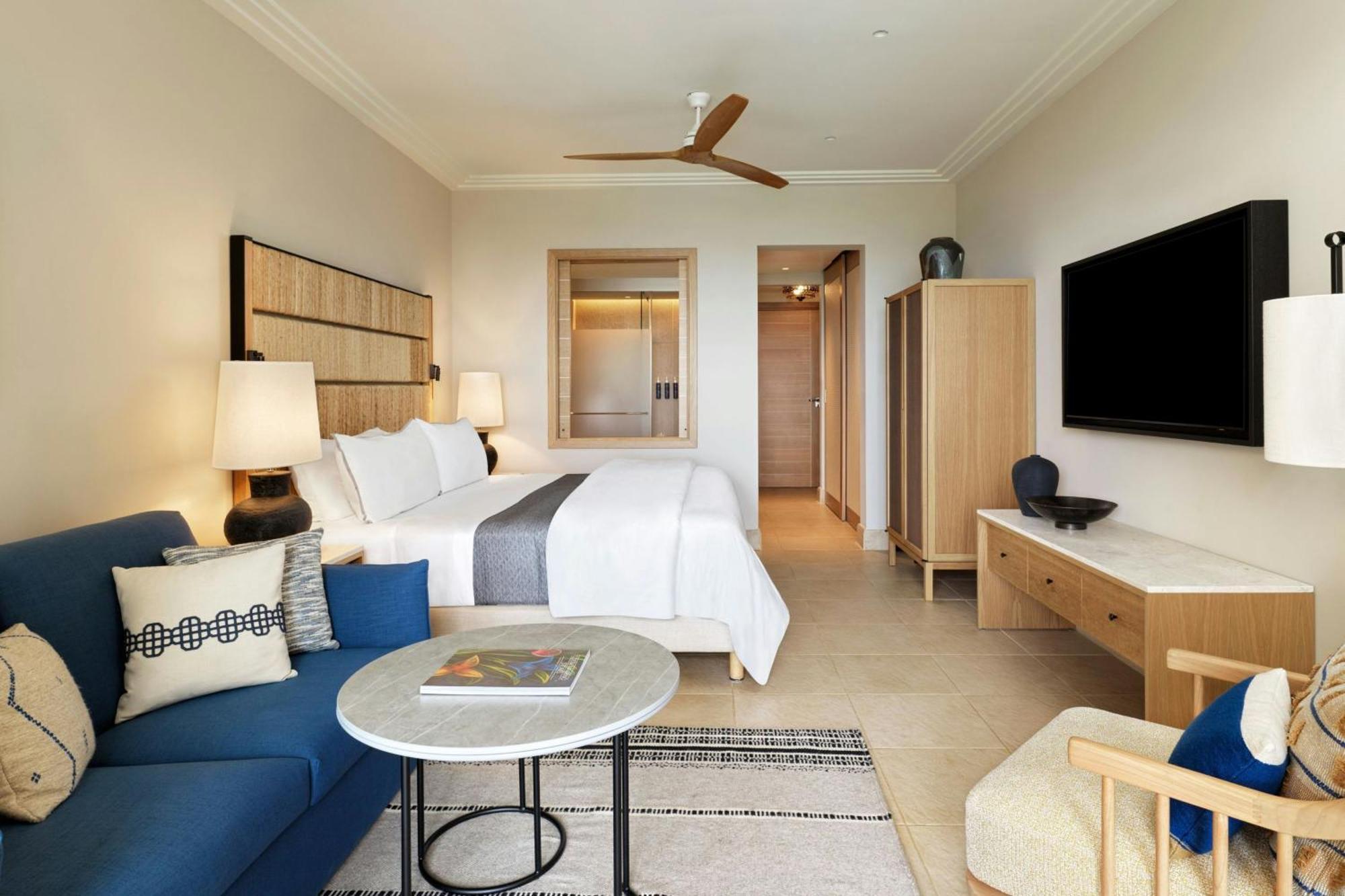 Habitación Premium Infinity con sofá cama y vistas al mar - Cama extragrande